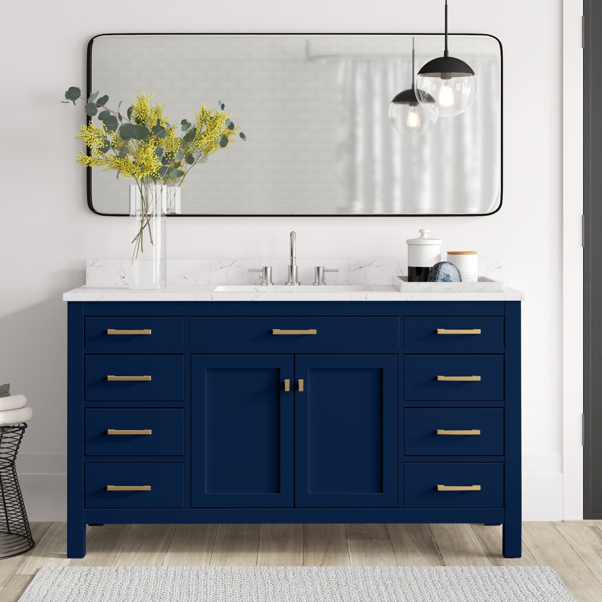 Blue bathroom vanity with gold handles