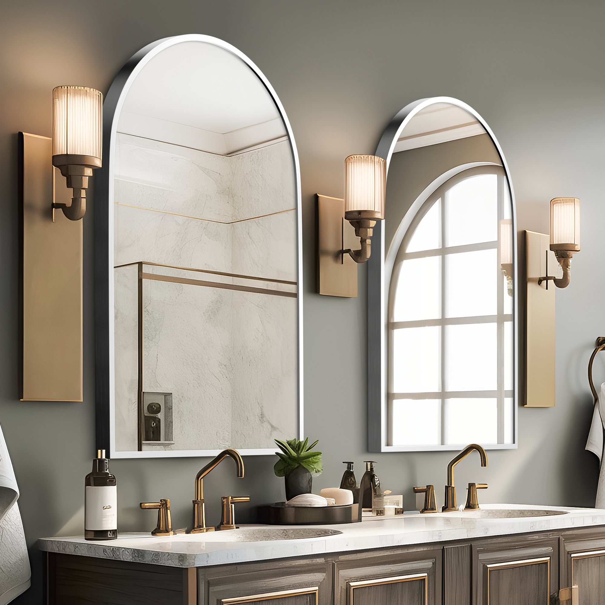 A pair of arched mirrors over a double-sink vanity