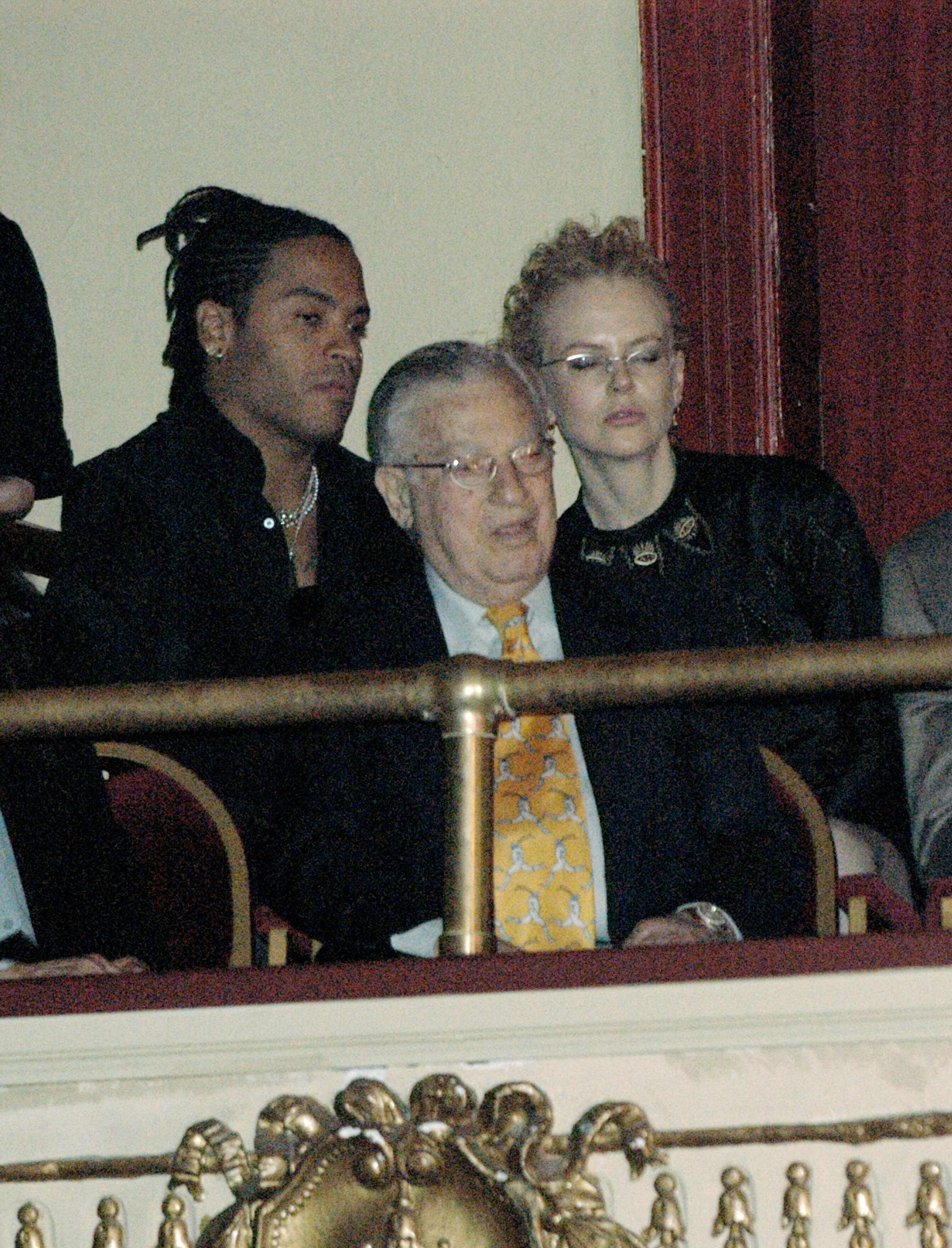 Lenny and Nicole seated in a theater box together