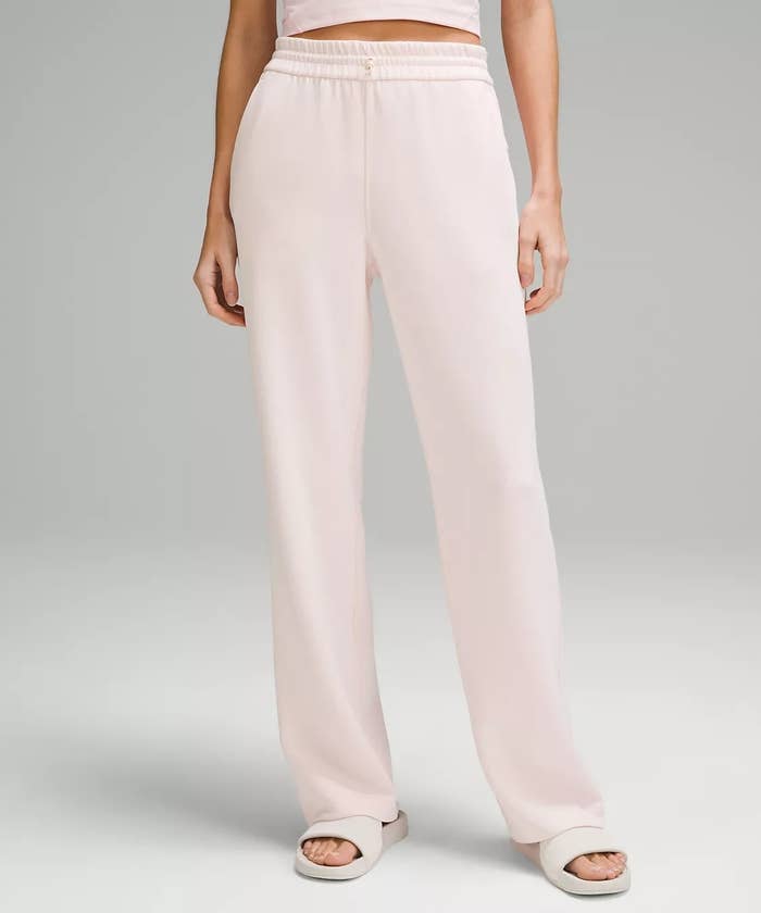 Model in light pink high-rise sweatpants