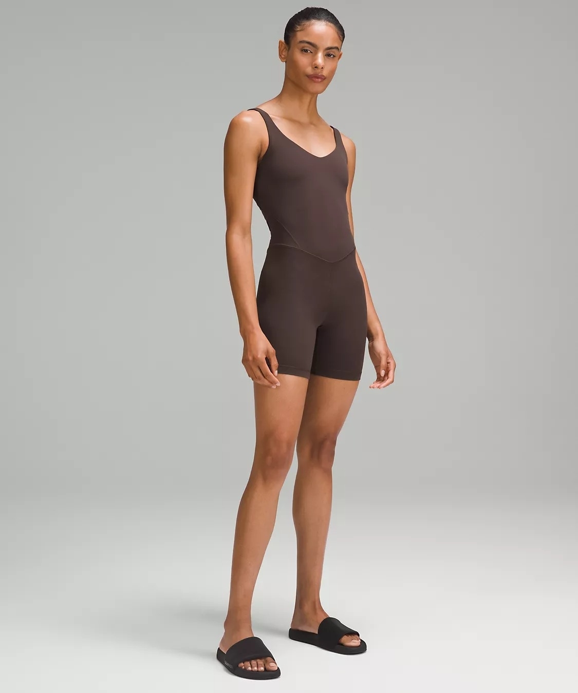 Model wearing brown sleeveless short bodysuit