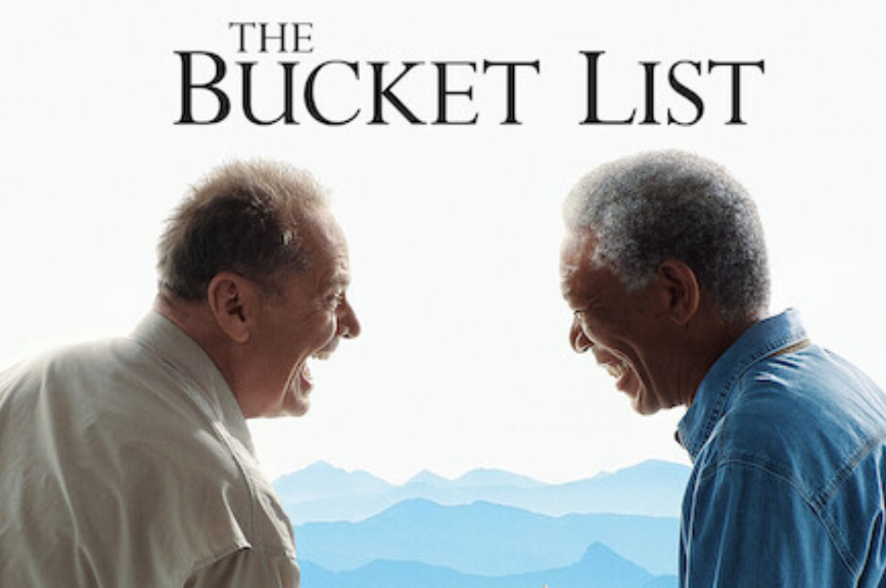 Two men smiling at each other, movie title &#x27;The Bucket List&#x27; above them