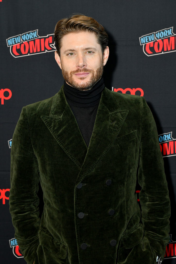Jensen in velvet suit and turtleneck at event