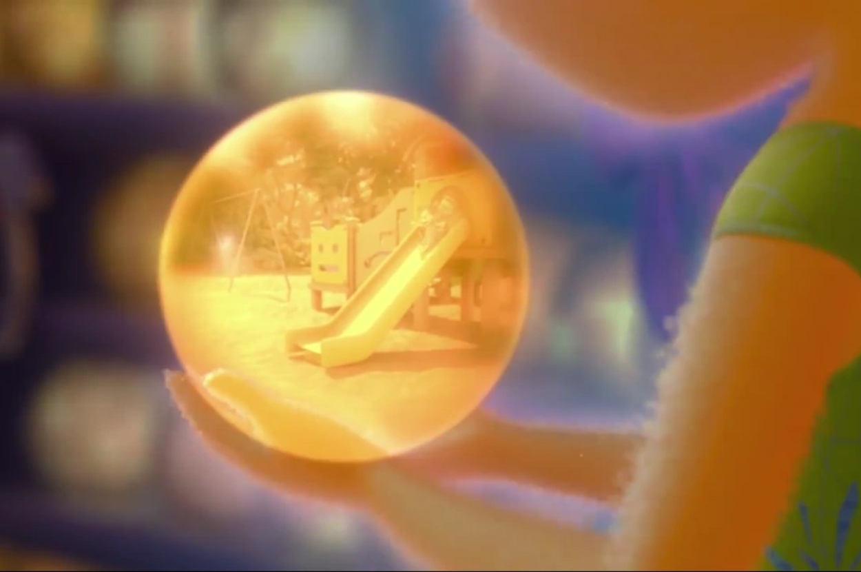 Magnifying glass revealing a playground slide, held by a cartoon character&#x27;s hand