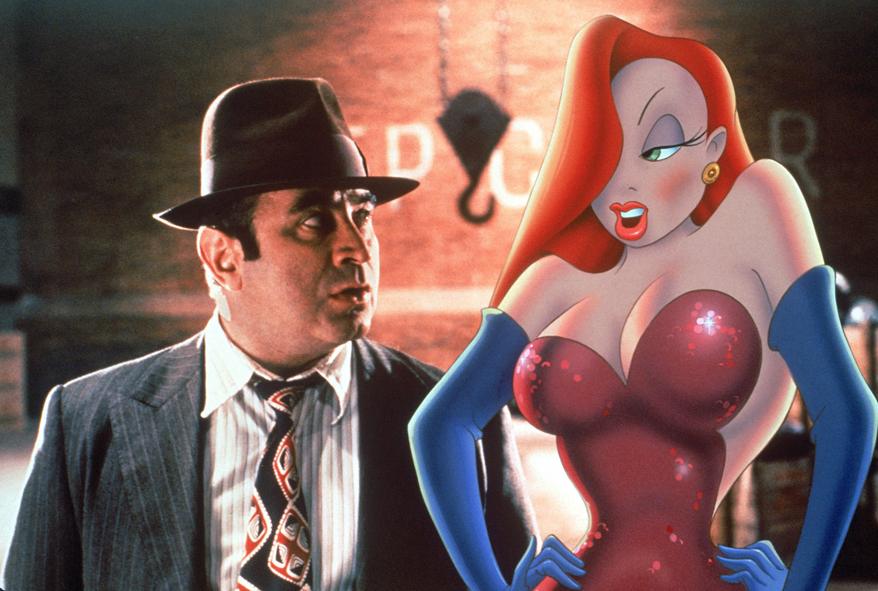 Eddie Valiant stands next to animated character Jessica Rabbit in a scene from &quot;Who Framed Roger Rabbit.&quot;