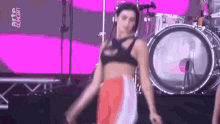 dua in the past dancing on stage looking bored