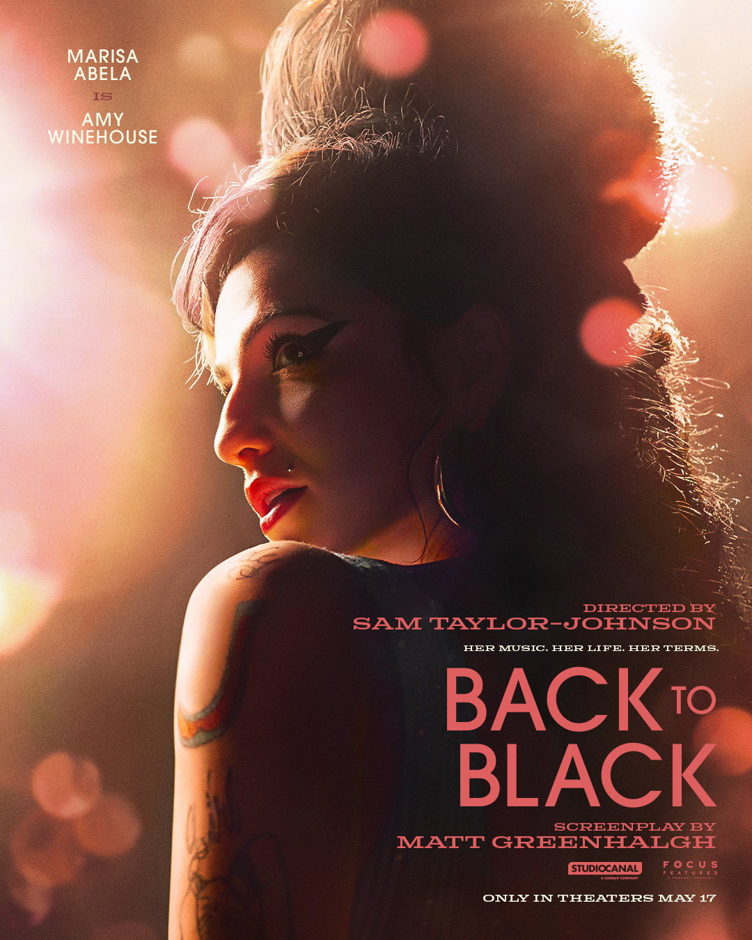 Poster for &quot;Back to Black&quot; film with Marisa Abela as Amy Winehouse, side profile, tattoos visible. In theaters May 17