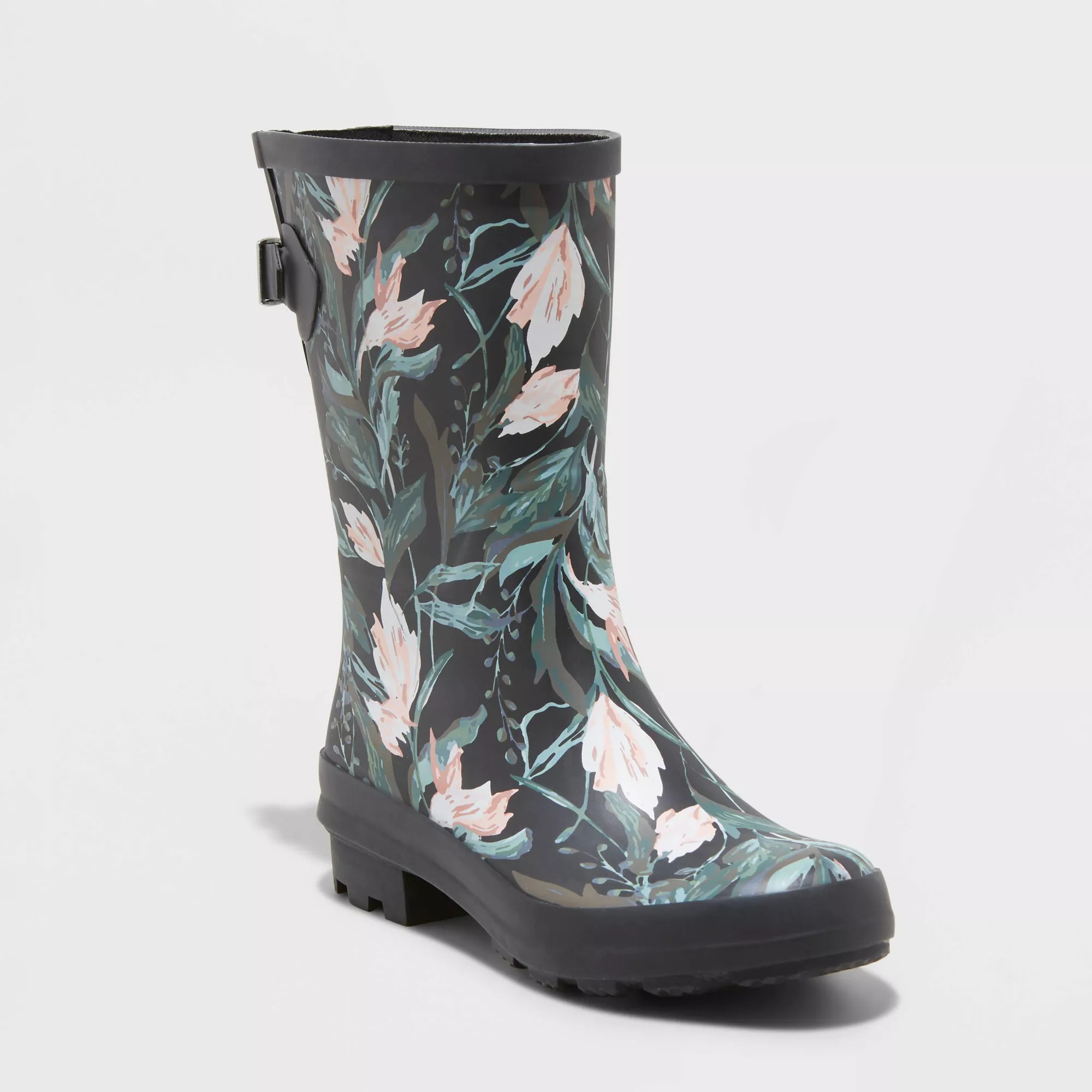 Floral patterned rain boot with mid-calf height and side buckle detail