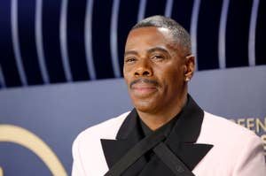 Man in a stylish tuxedo with a unique bow tie on a patterned background