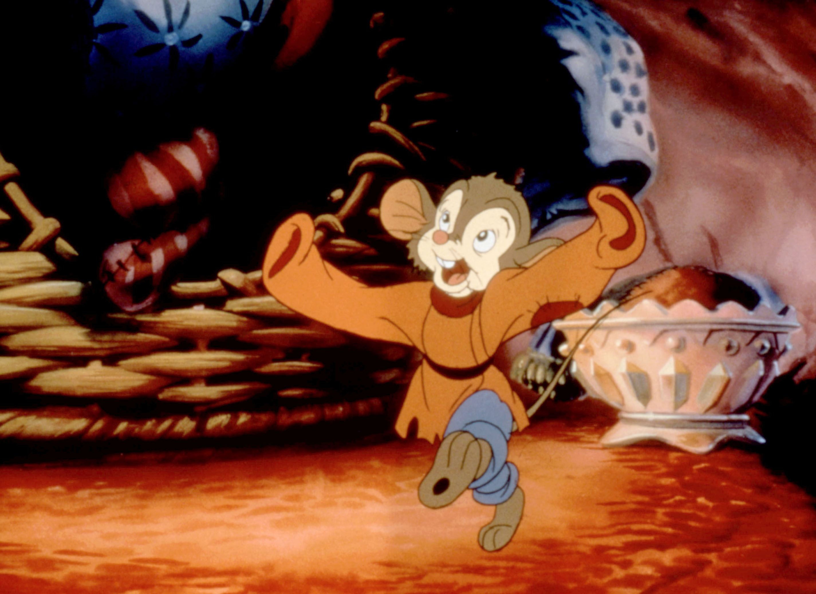 Fievel, an animated mouse from &quot;An American Tail,&quot; looks excited, escaping a woven basket