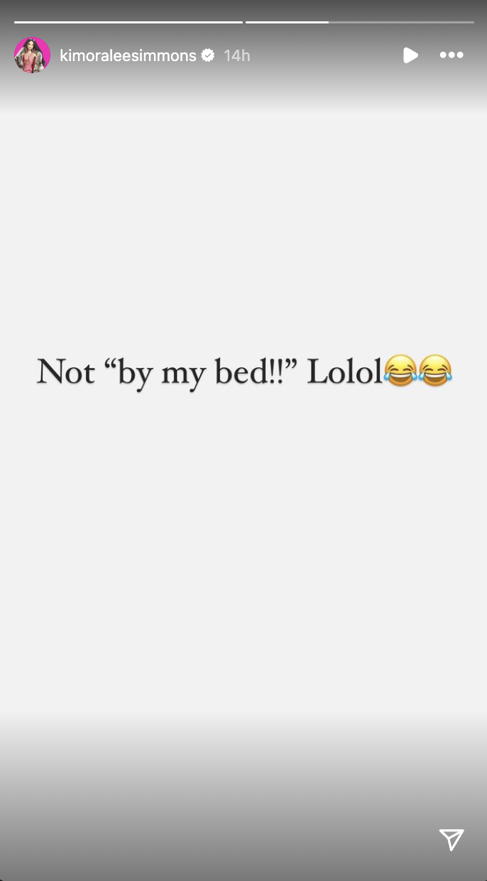 Screenshot of a social media story with text saying &quot;Not &#x27;by my bed!!&#x27; Lolol&quot; followed by laughing emojis
