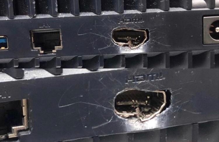 Close-up of a PS5 HDMI port damaged by forceful cable insertion
