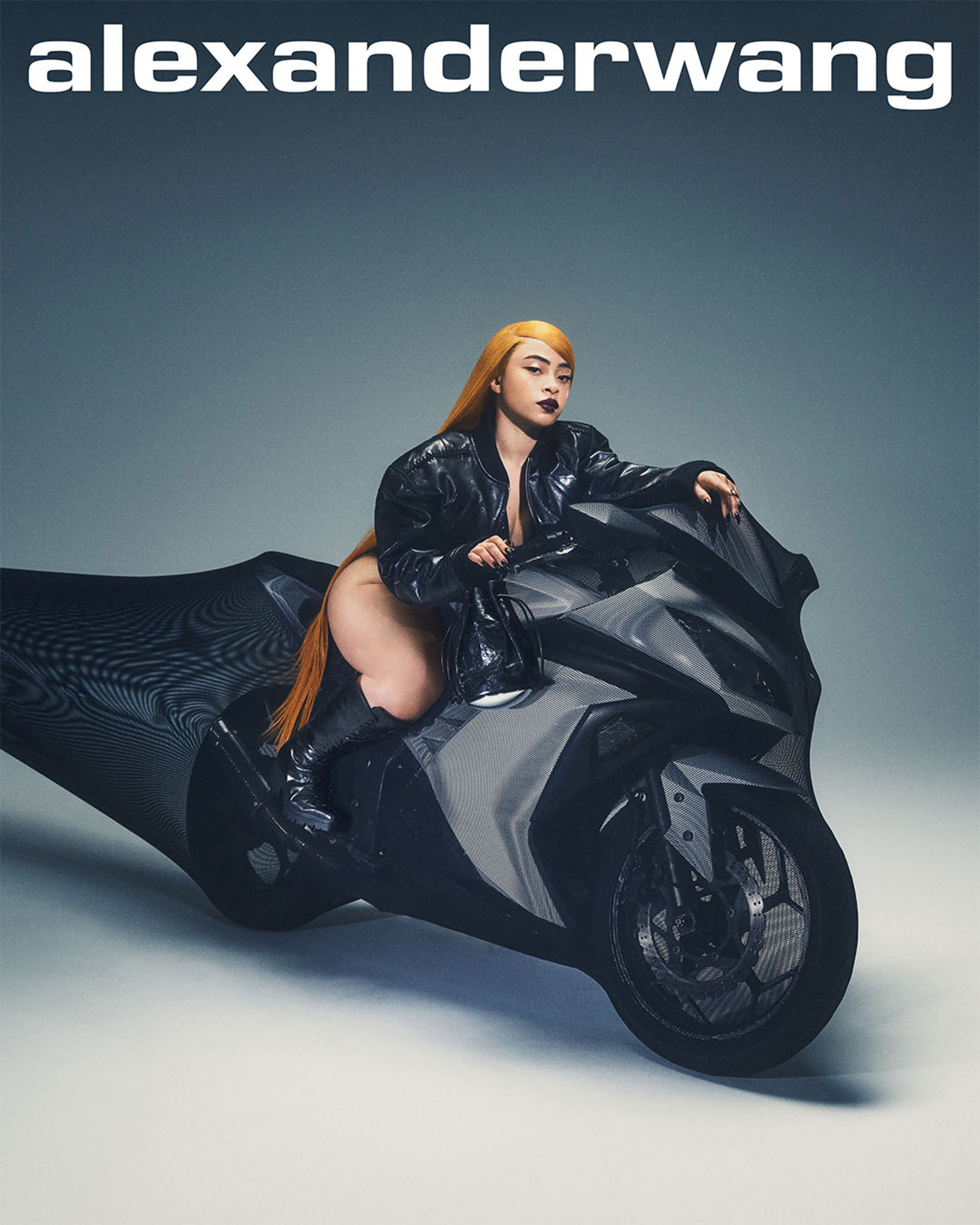Person in a black outfit on a motorcycle for an Alexander Wang advertisement