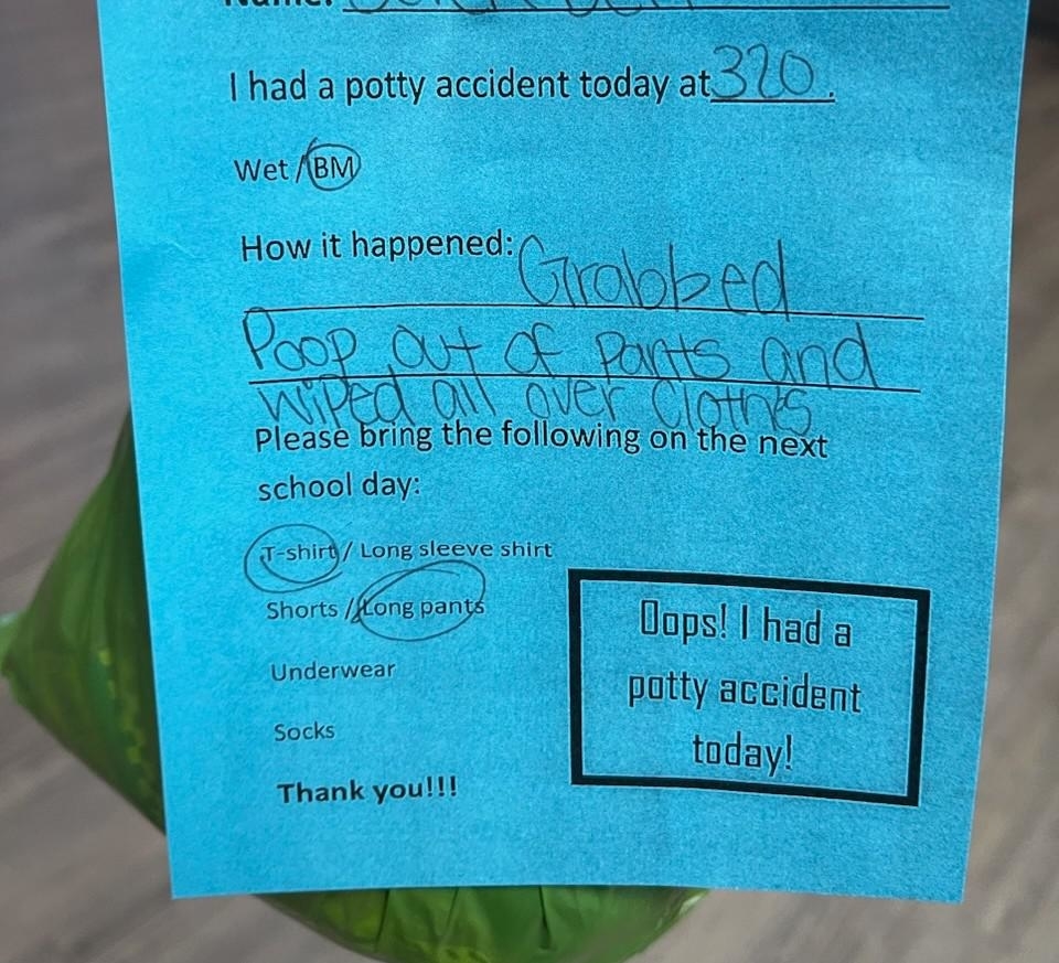 Note from a child about a potty accident at 3:10 PM, requesting a change of clothes for school