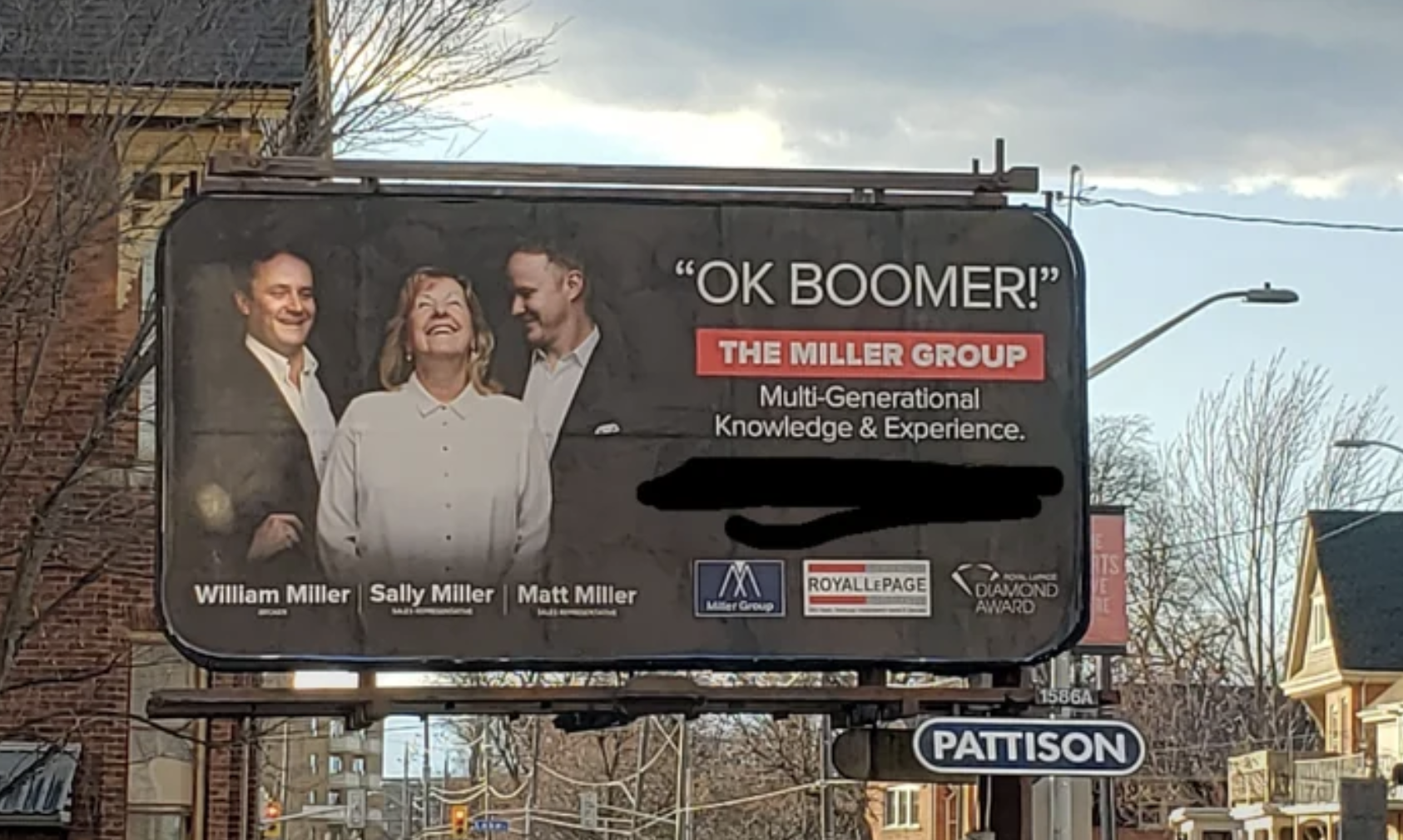 realtor billboard says &quot;OK BOOMER!