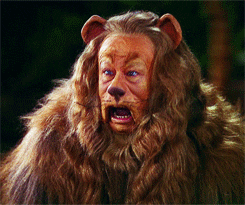 Animated character, the Cowardly Lion from The Wizard of Oz, appears concerned and talking