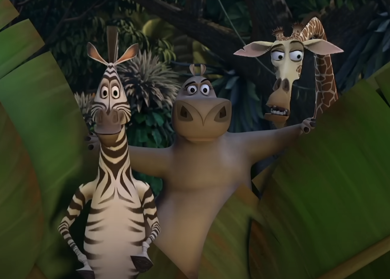Animated characters Marty the zebra, Alex the lion, and Melman the giraffe from the movie &quot;Madagascar&quot; are shown together smiling
