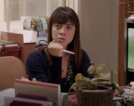 Aubrey Plaza in &quot;Parks &amp;amp; Rec&quot; with scissors in hand, ready to stab