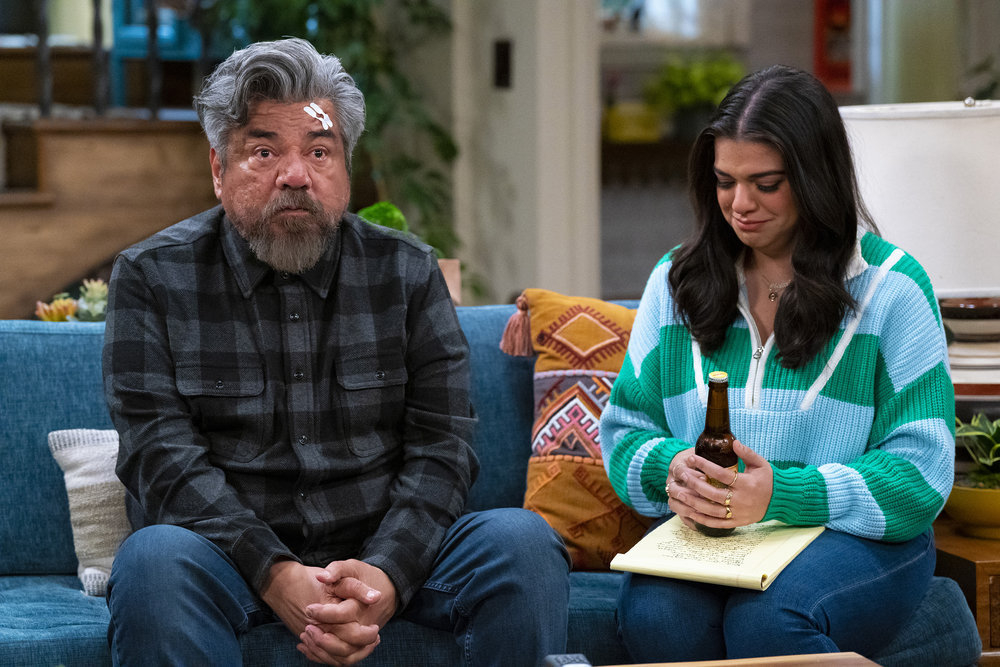 George Lopez and Mayan Lopez sitting on a couch