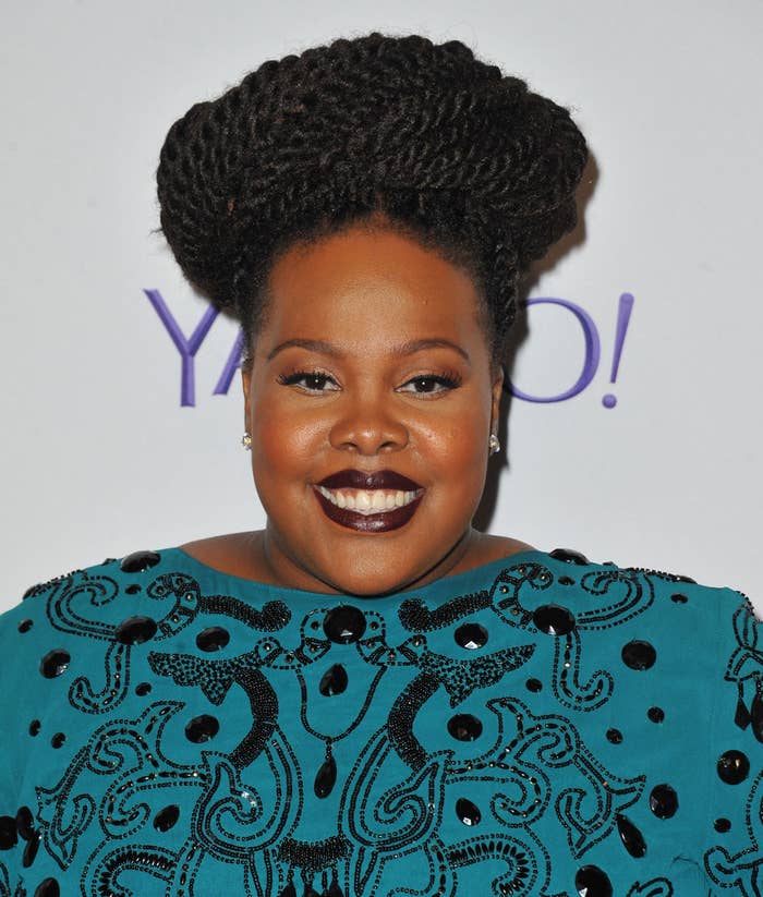 Amber Riley smiling at a Yahoo event