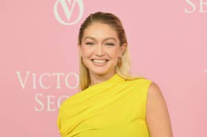 Gigi Hadid in a one-shoulder draped dress at an event