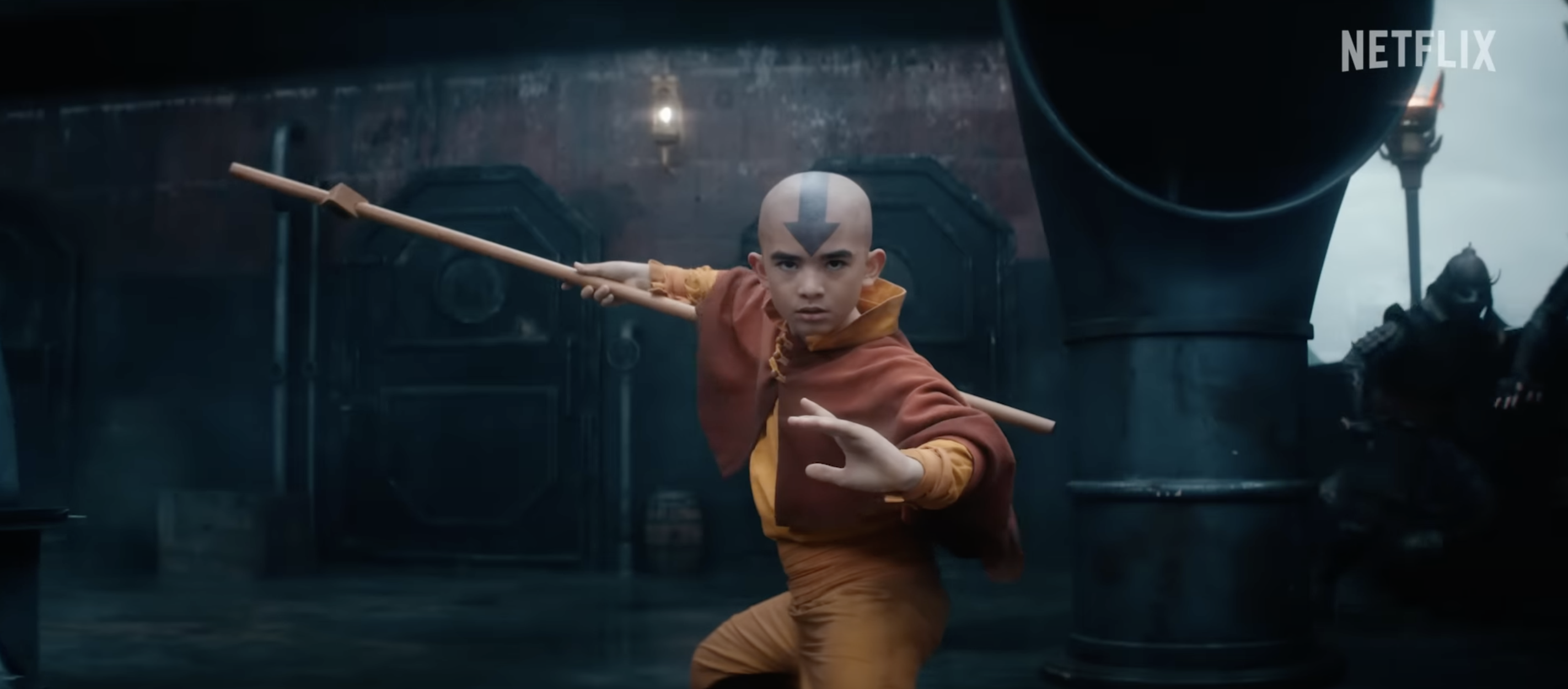 Aang, from &#x27;Avatar: The Last Airbender,&#x27; in a fighting stance with a staff