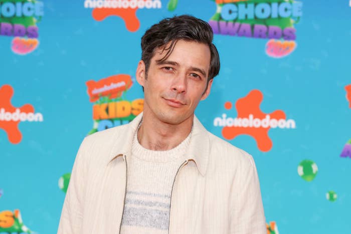 Matthew in a jacket and shirt standing at the Nickelodeon Kids&#x27; Choice Awards