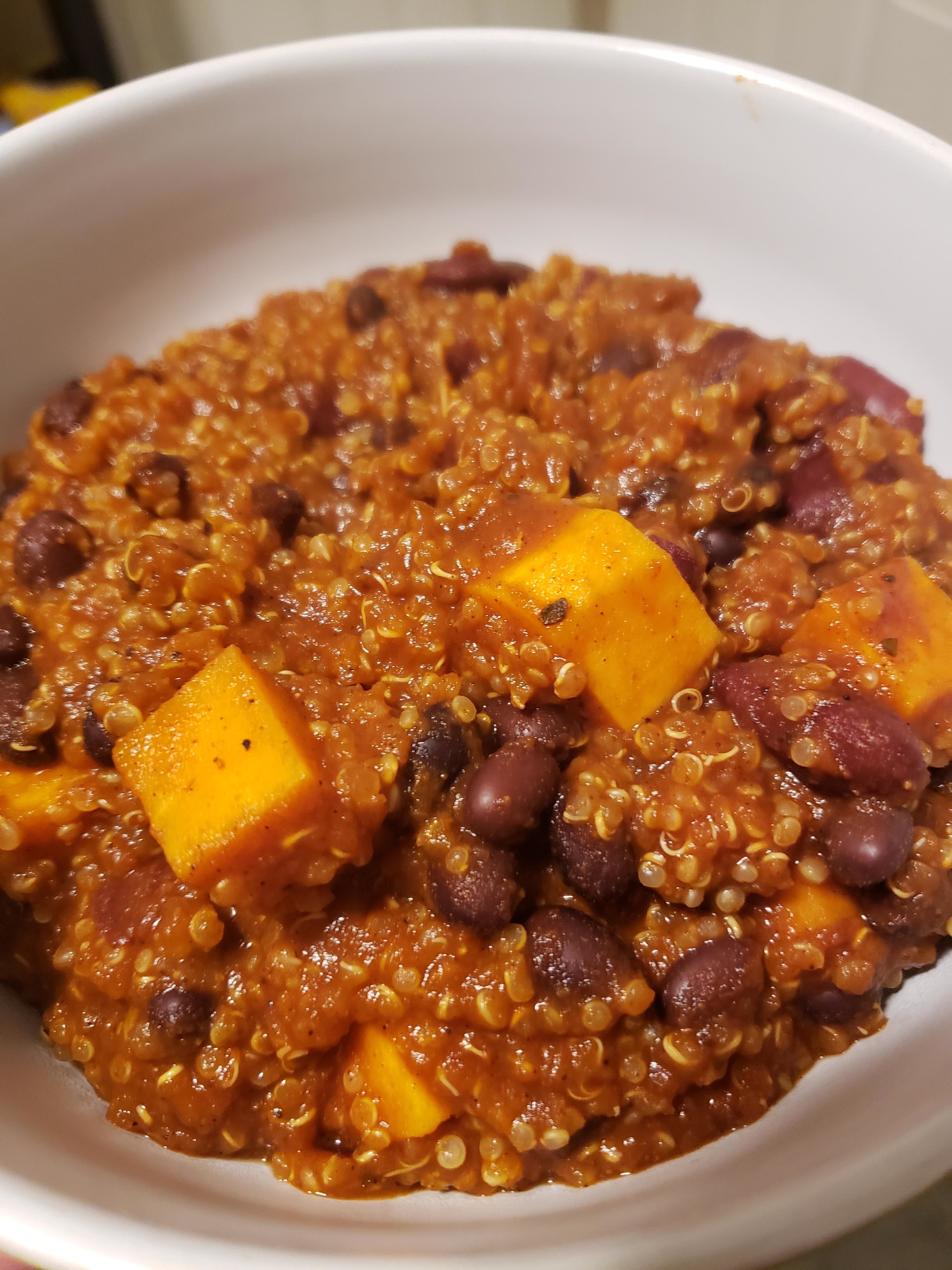 Bowl of quinoa, black beans, and sweet potato chunks