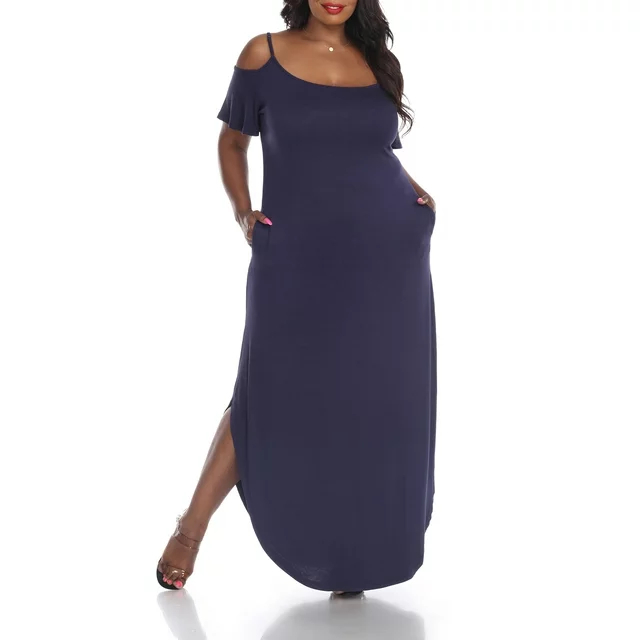 Model in a fashionable maternity dress with an off-shoulder design and side slit