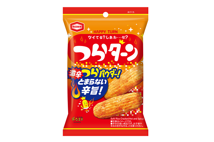 お菓子「ハッピーターン」のパッケージ。キャラクターと商品名が大きく表示されている。