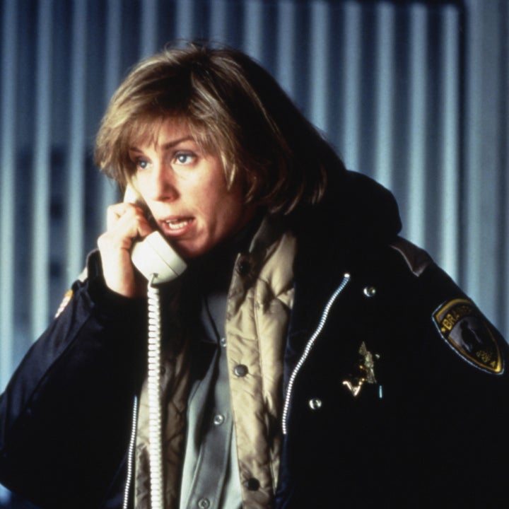 Frances McDormand as Marge Gunderson in a scene from "Fargo," on a phone, wearing a police uniform
