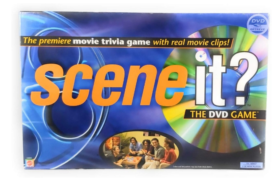 Scene It? DVD game box with title and group of people playing