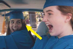 Two characters in graduation attire excitedly in a car from the TV show