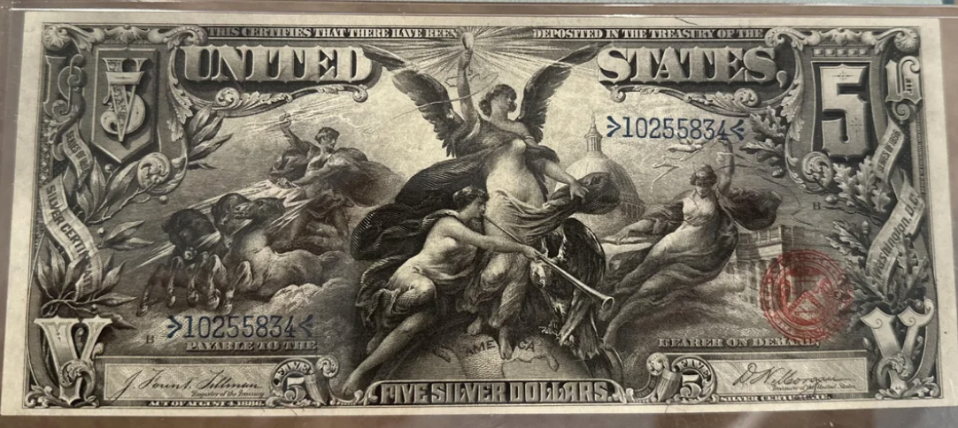 Early 19th-century $5 silver certificate with intricate engravings and historical allegorical figures