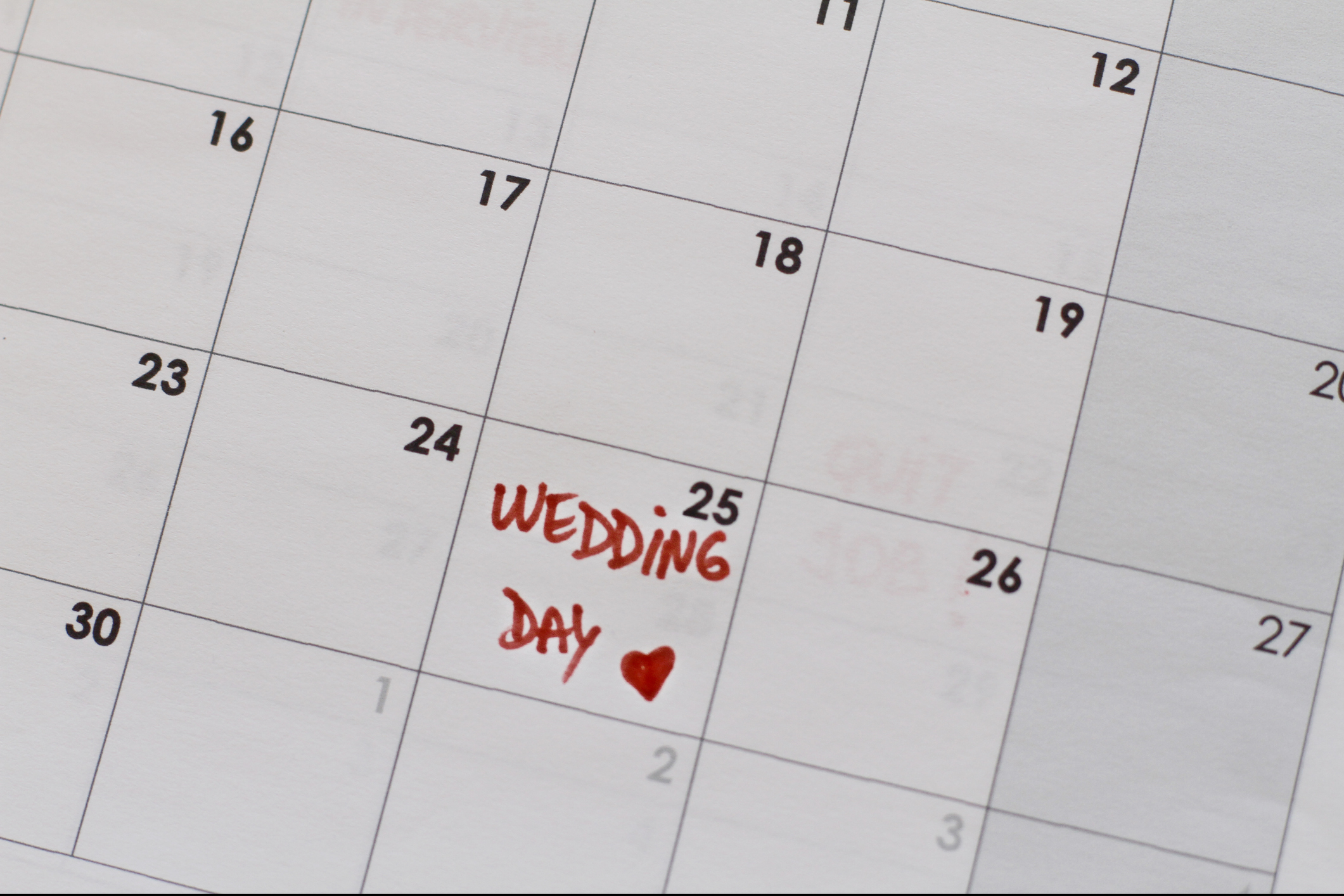 Calendar with the date marked as &quot;Wedding Day&quot; with a heart symbol for a reminder