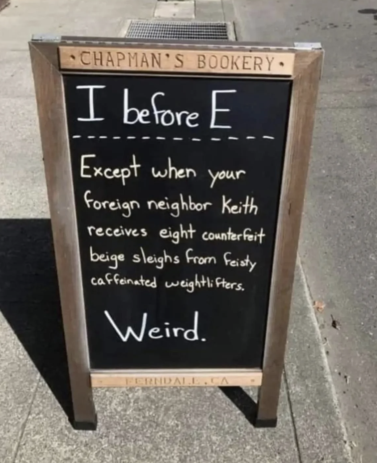 Sign with text &quot;I before E except when your foreign neighbor Keith receives eight counterfeit beige sleighs from feisty caffeinated weightlifters. Weird.&quot;