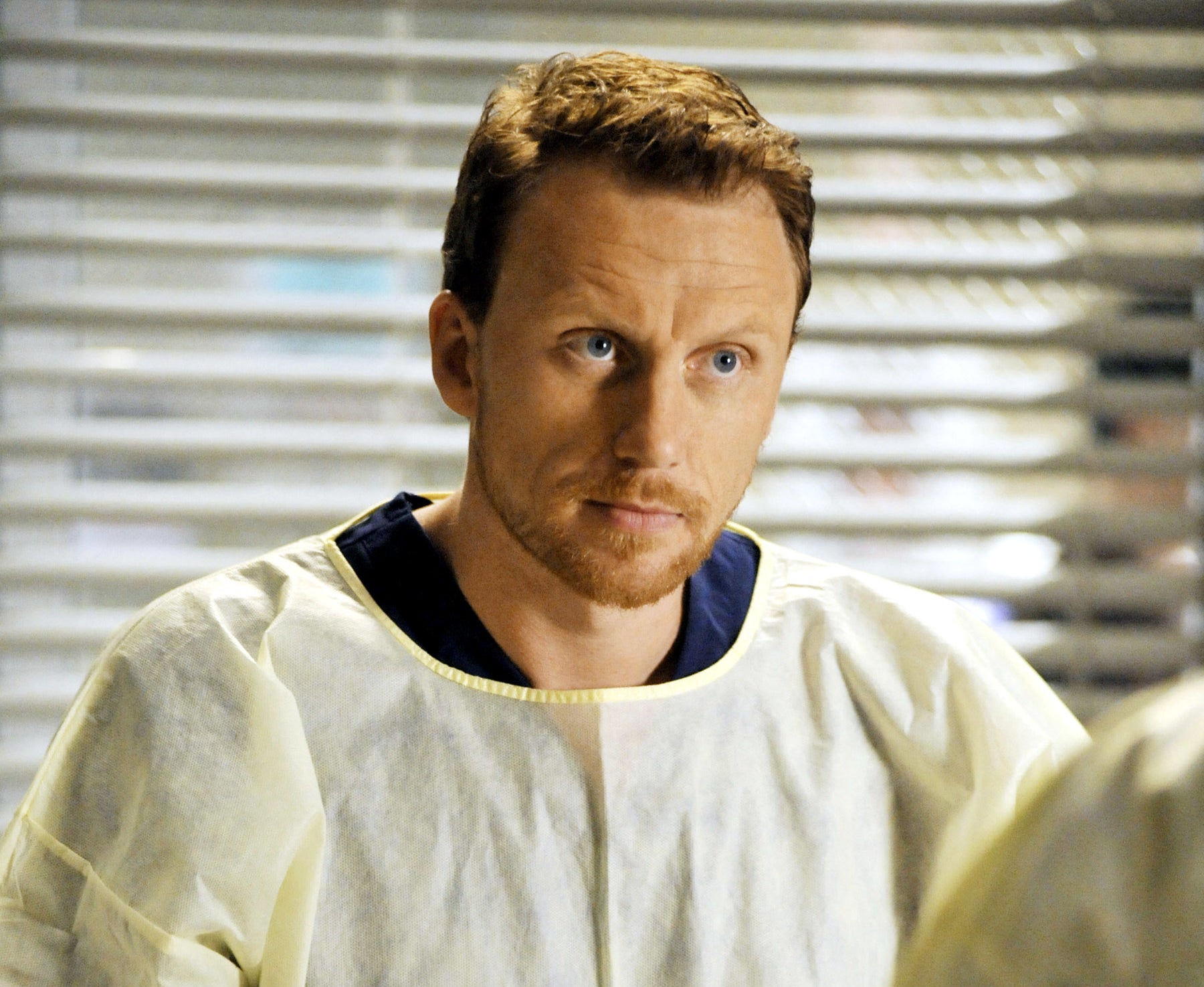 Owen Hunt from Grey&#x27;s Anatomy in scrubs, looking concerned in a hospital setting