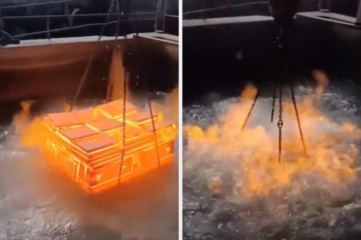 A molten metal container being submerged in water, causing steam and bubbles