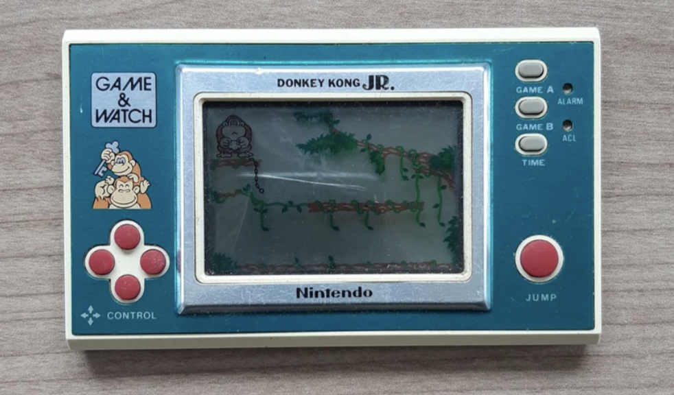 Vintage Game &amp;amp; Watch console featuring Donkey Kong Jr. game