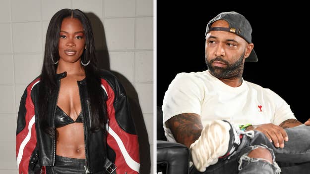 Ari Lennox wearing a black and red jacket with a crop top. Joe Budden in a white shirt and cap, sitting separately