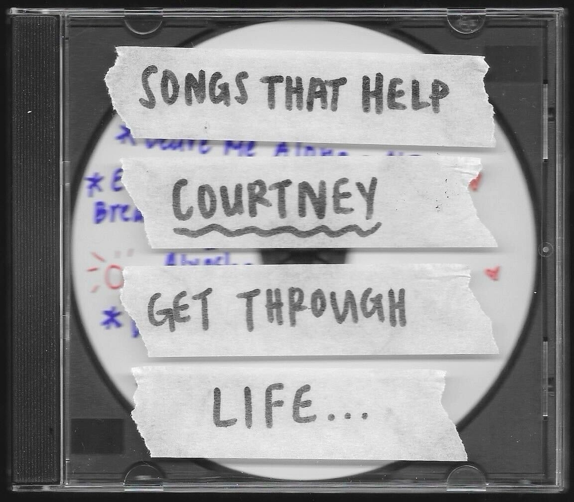 CD case with handwritten labels saying &quot;SONGS THAT HELP COURTNEY GET THROUGH LIFE...&quot;