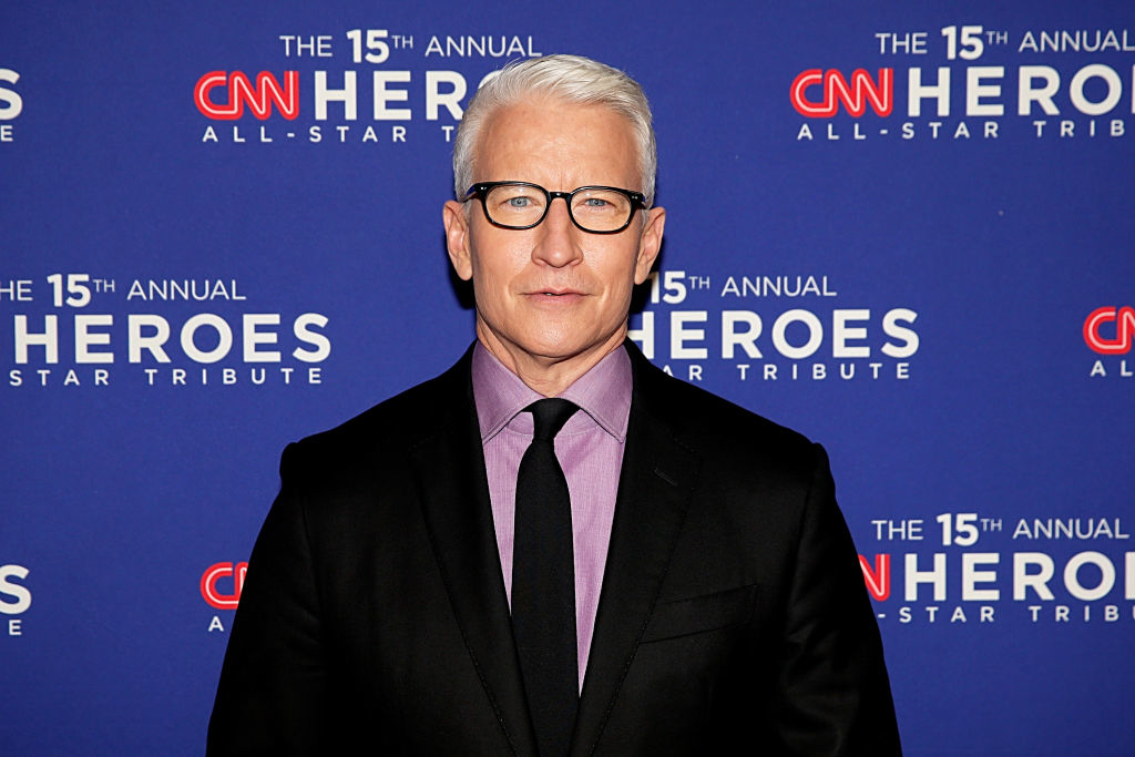Anderson Cooper in a black suit and tie, at CNN Heroes event