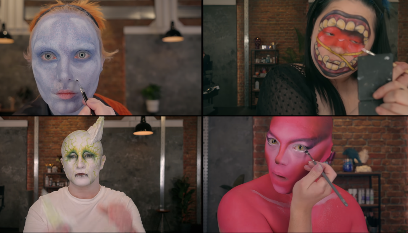 Four individuals applying dramatic face makeup, transforming into characters