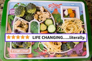 reviewer's portioned meal tray a divided tray with vegetables, pasta, and protein