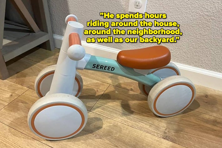 Child's balance bike with text overlay sharing a parent's quote on usage
