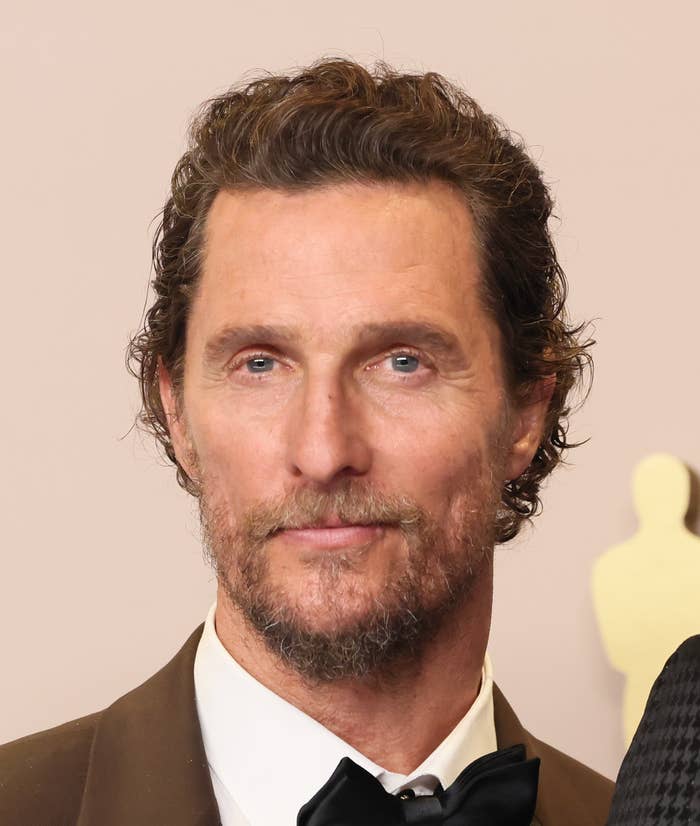 Matthew McConaughey in a formal suit with bow tie at an event