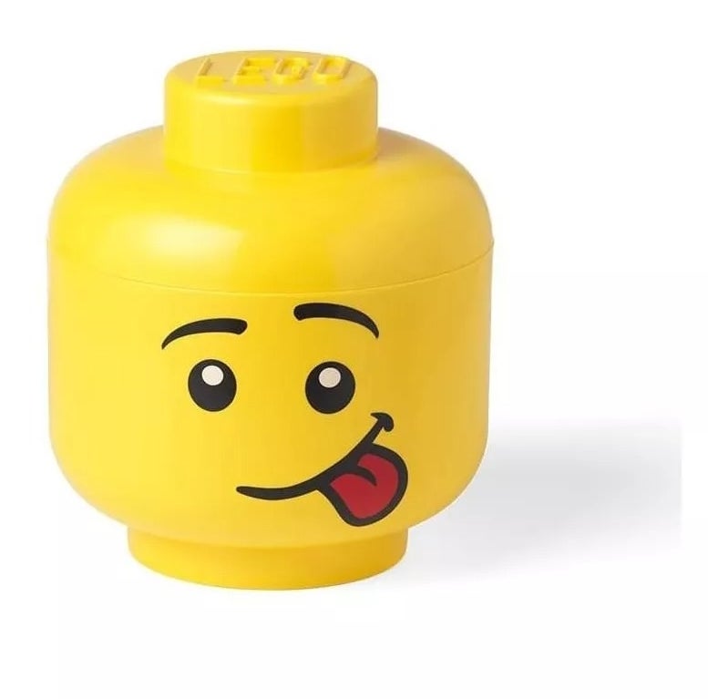 Lego head-shaped container with a playful facial expression, used for storing small items