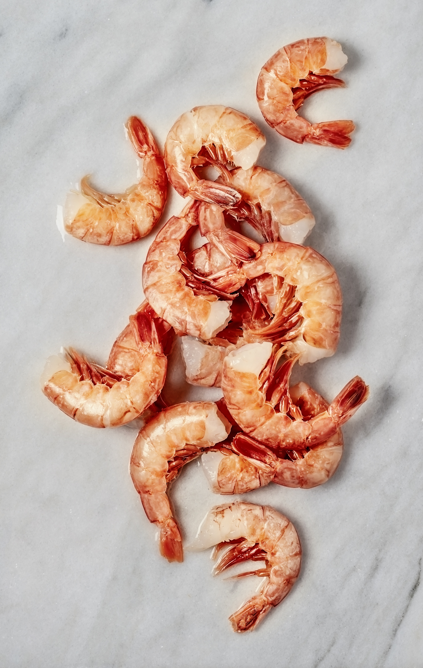 Cooked shrimp arranged on a flat surface, related to culinary aspects of dating