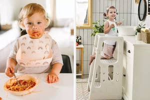 Toddler in a bib eating spaghetti; another standing on a kitchen helper stool