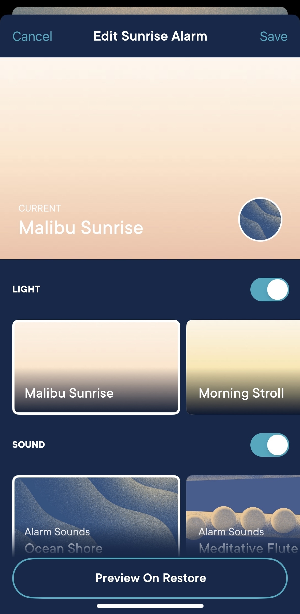 Phone screen displaying &quot;Edit Sunrise Alarm&quot; with toggle options for &quot;Malibu Sunrise&quot; and &quot;Morning Stroll&quot; under LIGHT and &quot;Ocean Shores&quot;, &quot;Alarm Sounds&quot;, and &quot;Meditative Flute&quot; under SOUND